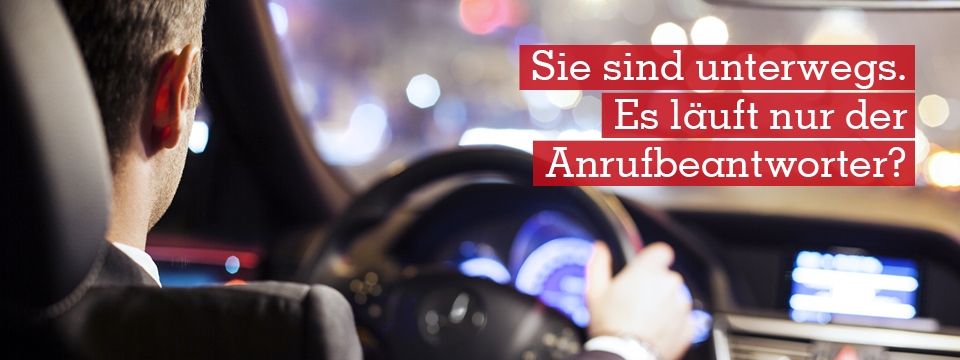 Ein Autofahrer, der eine Rufumleitung geschaltet hat und den Telefon-Service von Office-Work nutzt.